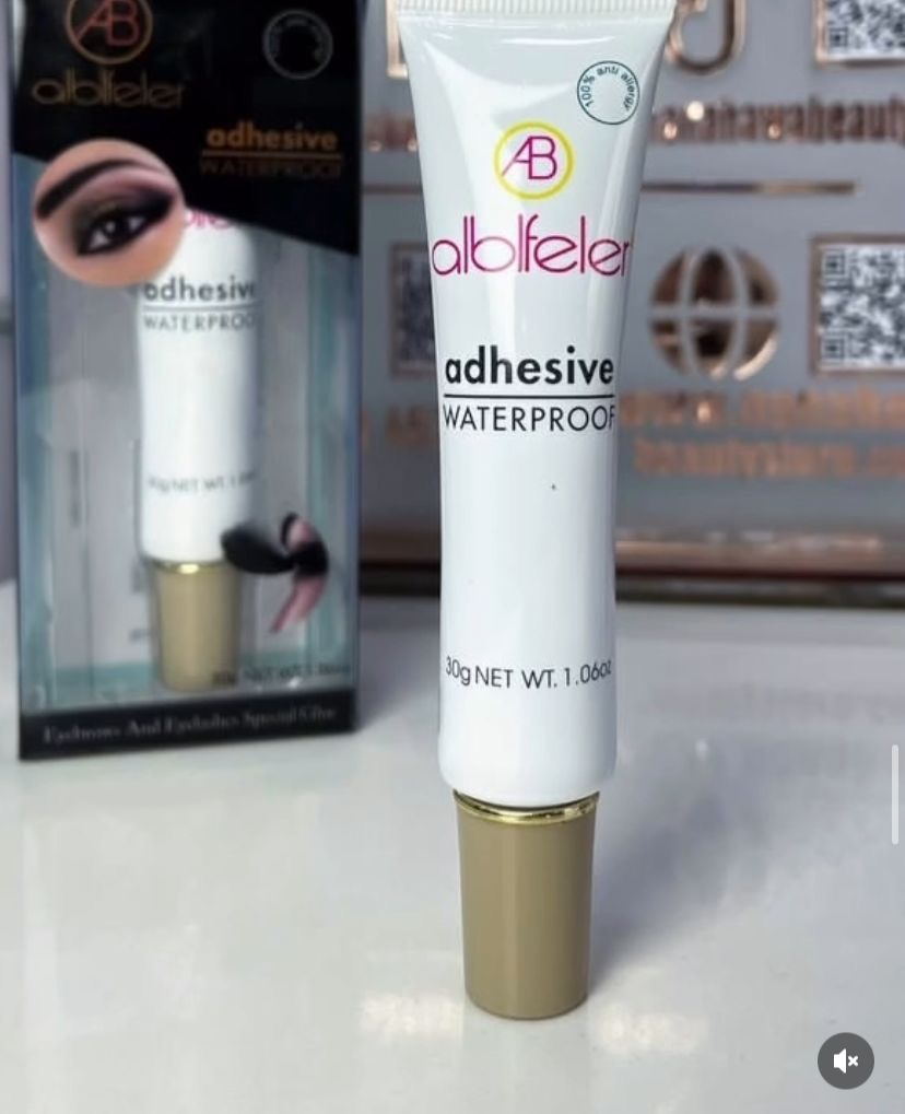 Adhesive lash glue